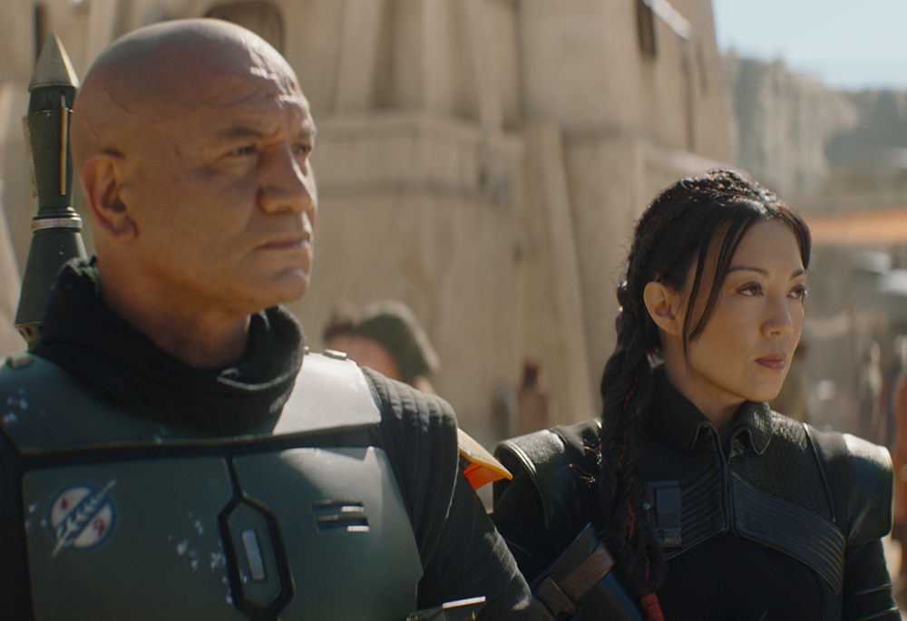 Temuera Morrison, left, is Boba Fett and Ming-Na Wen is Fennec Shand in Lucasfilm's "The Book of Boba Fett," exclusively on Disney+. (Lucasfilm Ltd.)