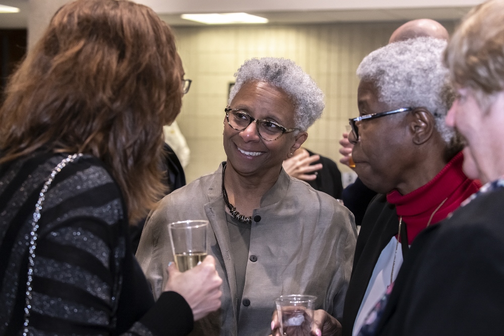 Theologian M. Shawn Copeland, center, speaks to guests on April 26 during the Boston College conference held in her honor. (Boston College/Lee Pellegrini)