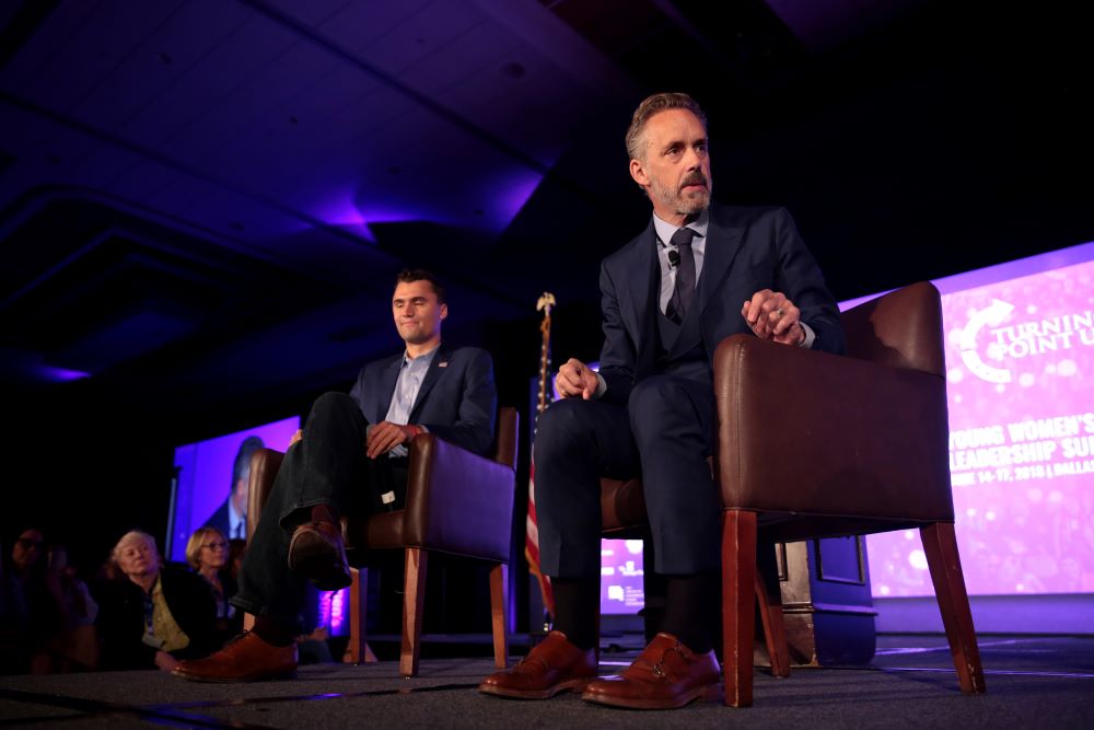 Jordan Peterson, right, and conservative political commentator Charlie Kirk speak with attendees at the 2018 Young Women's Leadership Summit hosted by Turning Point USA at the Hyatt Regency DFW Hotel in Dallas. 