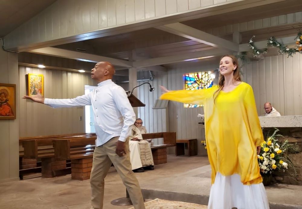 John West and Hilary Van Dixhorn lead the response to Psalm 149-150. Between them can be seen 93-year-old Fr. Philip Edwards, who has encouraged danced prayer.