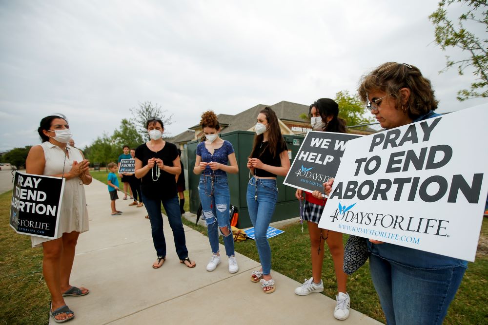 Anti-abortion demonstrators pray and protest outside Whole Women's Health of North Texas Oct. 1 in McKinney, Texas. (AP/Brandon Wade) 