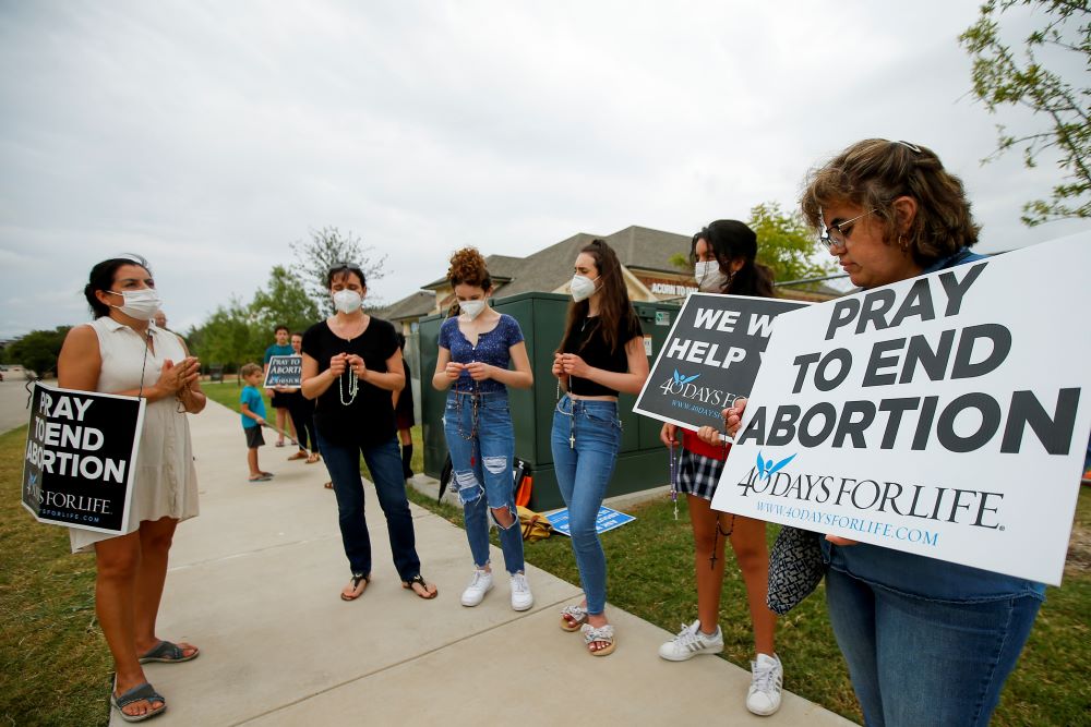 Anti-abortion demonstrators pray and protest outside Whole Women's Health of North Texas Oct. 1 in McKinney, Texas. (AP/Brandon Wade)