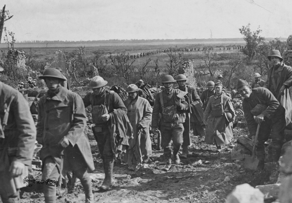 An American machine gun company passes through the ruins of a French village in advance of the Battle of Saint-Mihiel in September 1918. (U.S. National Archives) An American machine gun company passes through the ruins of a French village in advance of the Battle of Saint-Mihiel in September 1918. (U.S. National Archives)