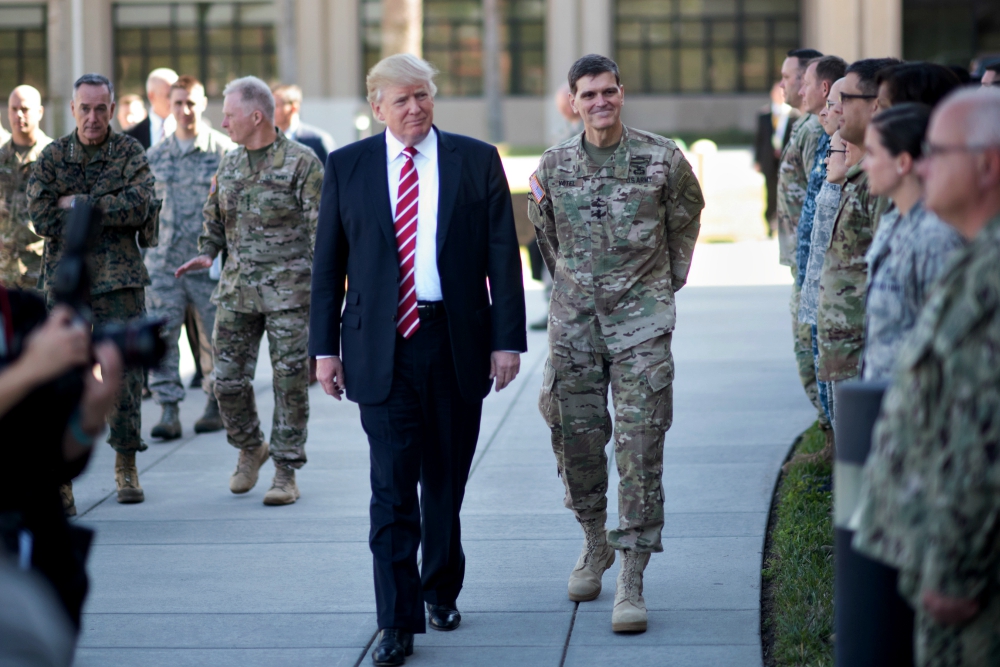 President Donald Trump and Gen. Joseph Votel meet with service members at MacDill Air Force Base in Florida in February. (Department of Defense/D. Myles Cullen)