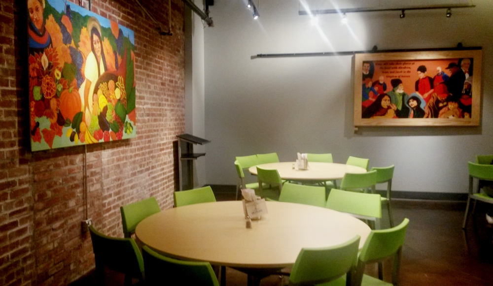 The dining room at Bishop Sullivan Center's One City Café is pictured Feb. 26 shortly before diners arrive for the evening meal. (NCR photo/Maria Benevento) The dining room at Bishop Sullivan Center's One City Café is pictured Feb. 26 shortly before diners arrive for the evening meal. (NCR photo/Maria Benevento)