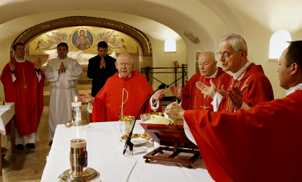 U.S. bishops, including then-Cardinal Theodore McCarrick (third from right), celebrate the Eucharist in the crypt of St. Peter's Basilica during their January 2012 "ad limina" visits to the Vatican. (CNS/Paul Haring)