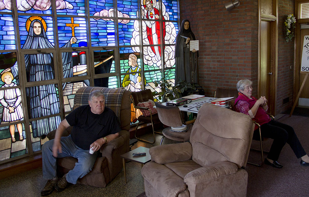 Former parishioners at the now-closed St. Frances Cabrini Church in Scituate, Massachusetts, are seen holding a vigil in May 2015. (CNS/The Pilot/Christopher S. Pineo) Former parishioners at the now-closed St. Frances Cabrini Church in Scituate, Massachusetts, are seen holding a vigil in May 2015. (CNS/The Pilot/Christopher S. Pineo)