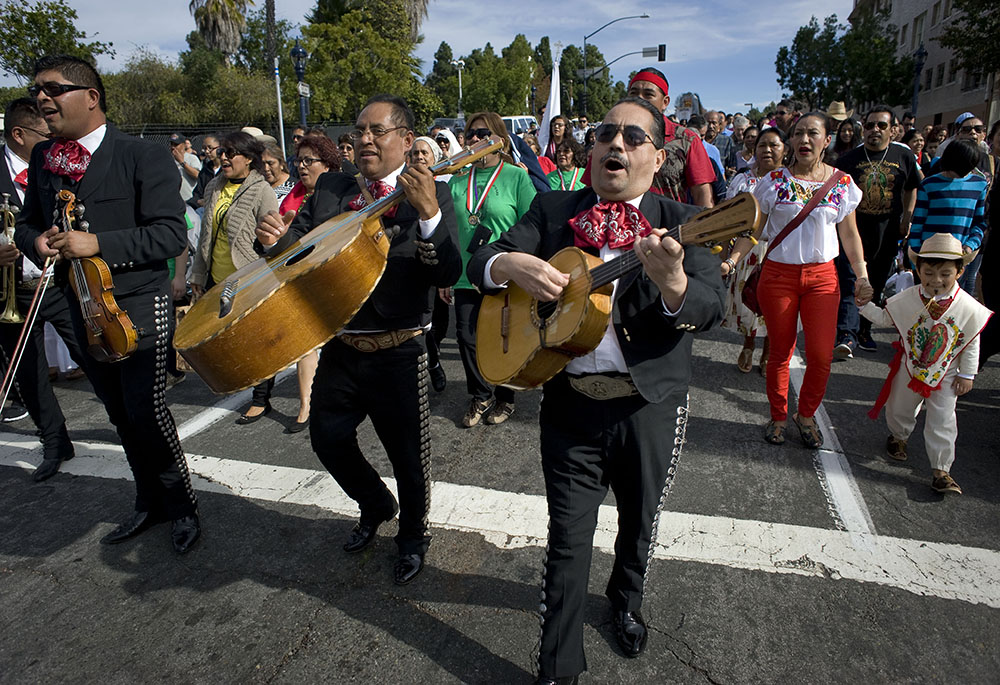 A mariachi group plays during a procession in honor of Our Lady of Guadalupe Dec. 6, 2015, in San Diego. (CNS/David Maung)