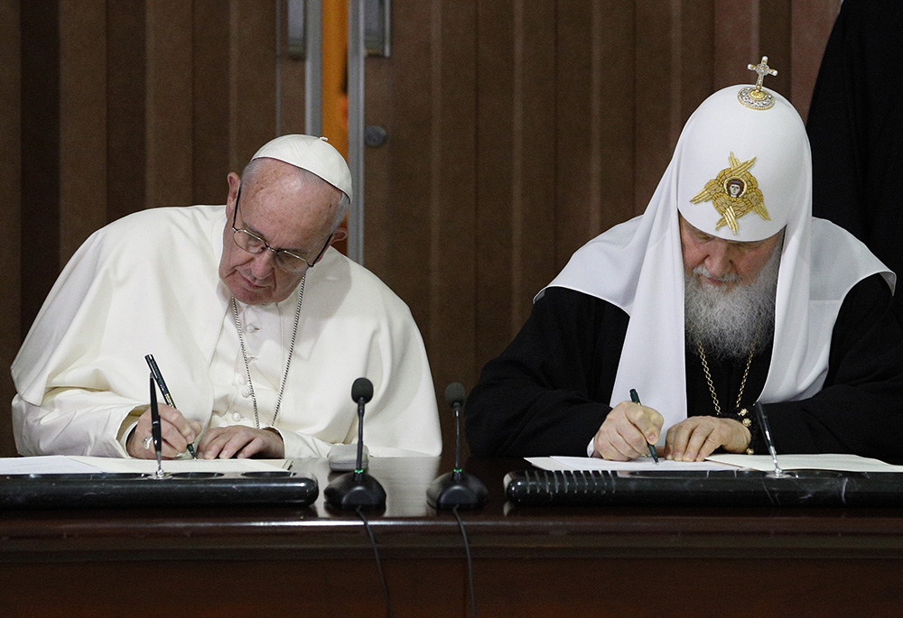 Pope Francis and Russian Orthodox Patriarch Kirill of Moscow sign a joint declaration during a meeting at Jose Marti International Airport Feb. 12, 2016, in Havana. (CNS/Paul Haring)