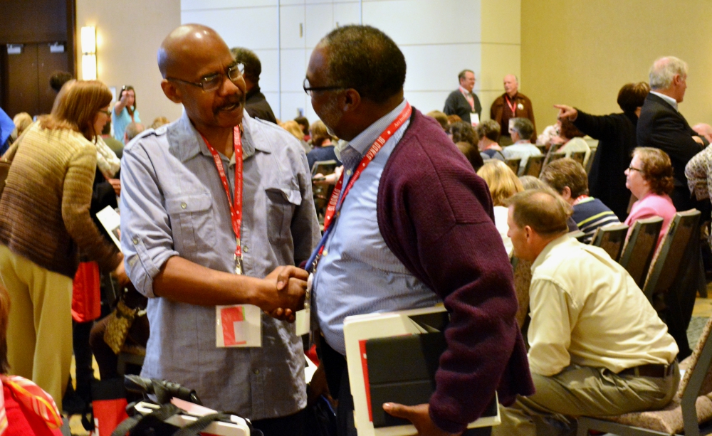 Synod members greet one another during the opening session of the Detroit Archdiocese's synod in November 2016. (CNS/The Michigan Catholic/Mike Stechschulte) Synod members greet one another during the opening session of the Detroit Archdiocese's synod in November 2016. (CNS/The Michigan Catholic/Mike Stechschulte)