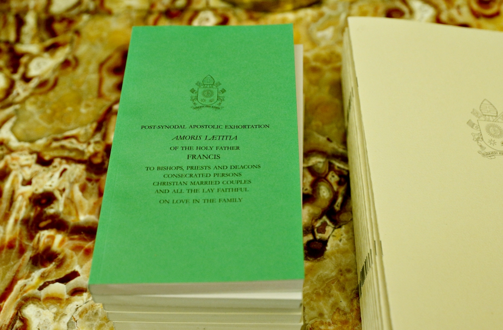 Copies of Pope Francis' apostolic exhortation on the family, "Amoris Laetitia," are seen on a table at the Vatican in January 2017. (CNS/Paul Haring) Copies of Pope Francis' apostolic exhortation on the family, "Amoris Laetitia," are seen on a table at the Vatican in January 2017. (CNS/Paul Haring)