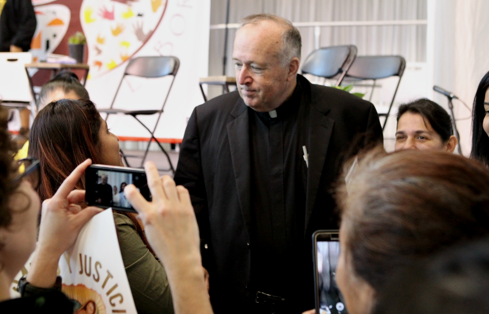 Bishop Robert McElroy of San Diego meets with Latino grassroots activists after his Feb. 18 talk at the U.S. Regional World Meeting of Popular Movements in Modesto, California. (CNS/Dennis Sadowski) Bishop Robert McElroy of San Diego meets with Latino grassroots activists after his Feb. 18 talk at the U.S. Regional World Meeting of Popular Movements in Modesto, California. (CNS/Dennis Sadowski)