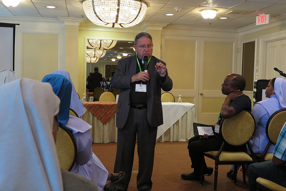 Jesuit Fr. Allan Deck gives the July 27, 2017, keynote address during the 18th annual convention of the African Conference of Catholic Clergy and Religious in the United States in New Orleans. He spoke May 15 during the virtual colloquium of the Academy o