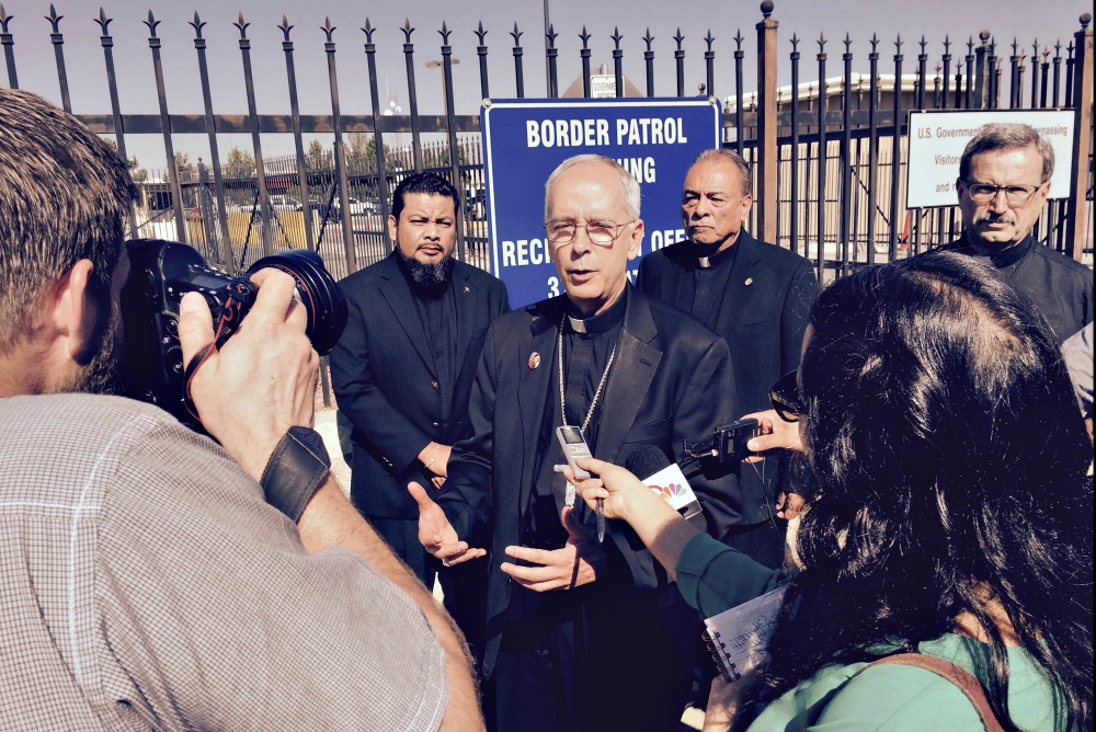 Bishop Mark Seitz speaks to reporters before attending an Aug. 7 meeting with immigration officials to try to stop the imminent deportation of Maria De Loera, whose 8-year-daughter is in a Texas hospital being treated for bone cancer. De Loera, the child'