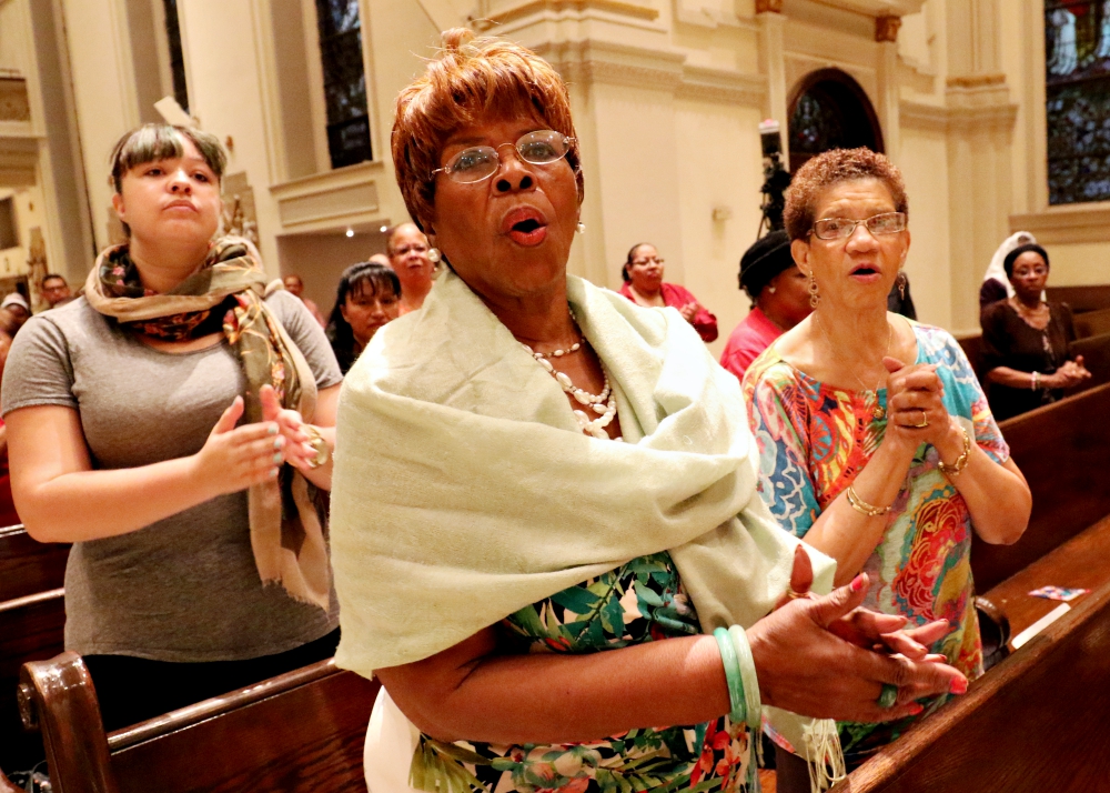 Women sing during a Mass for solidarity and peace Aug. 24, 2017, at St. James Cathedral Basilica in Brooklyn, New York. (CNS/Gregory A. Shemitz) Women sing during a Mass for solidarity and peace Aug. 24, 2017, at St. James Cathedral Basilica in Brooklyn, New York. (CNS/Gregory A. Shemitz)