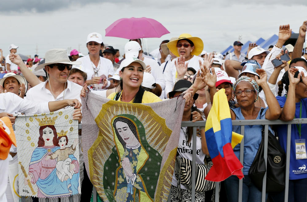 People celebrate as Pope Francis celebrates Mass at Contecar terminal in Cartagena, Colombia, Sept. 10. (CNS/Paul Haring)