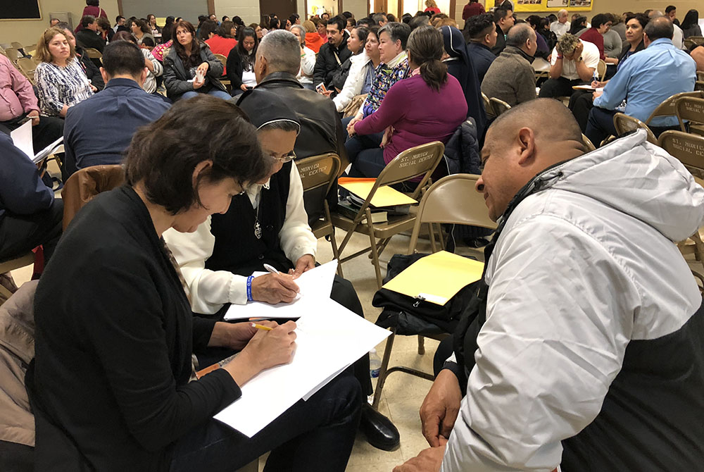 A woman religious and other delegates share information during a regional encuentro in the Diocese of Rockford, Illinois, April 28, 2018, at St. Monica Parish in Carpentersville. (CNS/El Observador/Margarita Mendoza) A woman religious and other delegates share information during a regional encuentro in the Diocese of Rockford, Illinois, April 28, 2018, at St. Monica Parish in Carpentersville. (CNS/El Observador/Margarita Mendoza)