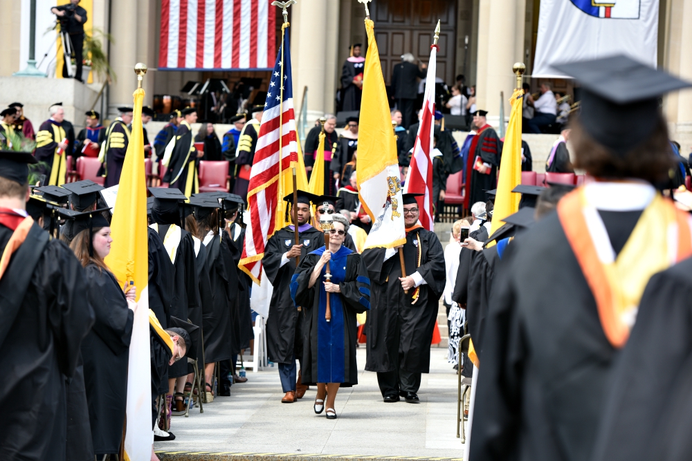 Students and faculty at the Catholic University of America celebrate graduation May 12 in Washington. (CNS/The Catholic University of America/Dana Rene Bowler) Students and faculty at the Catholic University of America celebrate graduation May 12 in Washington. (CNS/The Catholic University of America/Dana Rene Bowler)