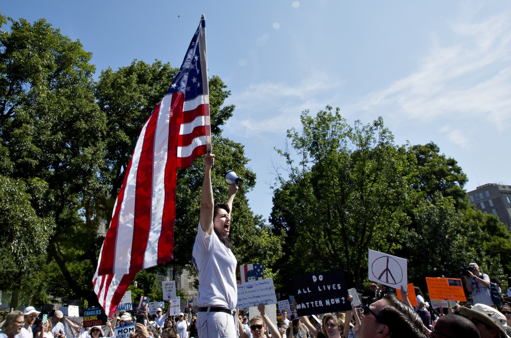 Demonstrators in Washington protest the Trump administration's immigration policy during a national day of action called "Keep Families Together" June 30. (CNS/Tyler Orsburn)