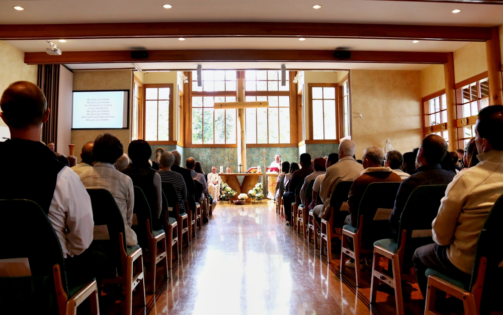 Worshipers attend an anniversary Mass June 2 at Our Lady of the Mountains in Whistler, British Columbia. (CNS/B.C. Catholic/Agnieszka Krawczynski)