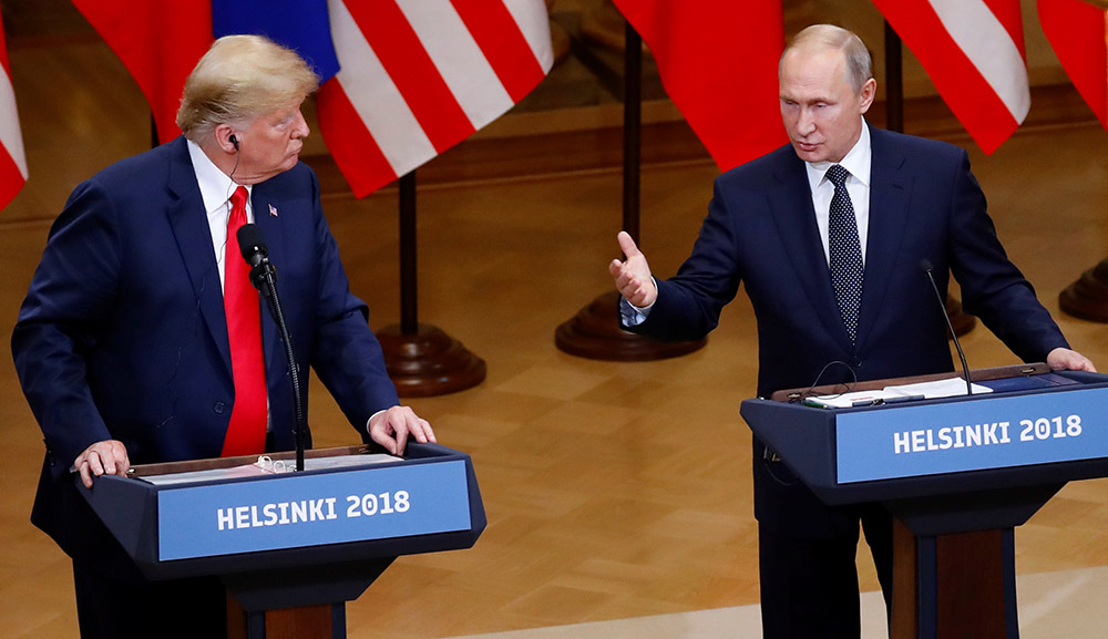 Then-President Donald Trump and Russian President Vladimir Putin hold a joint news conference after their July 16, 2018, meeting in Helsinki, Finland. (CNS/Reuters/Leonhard Foeger)