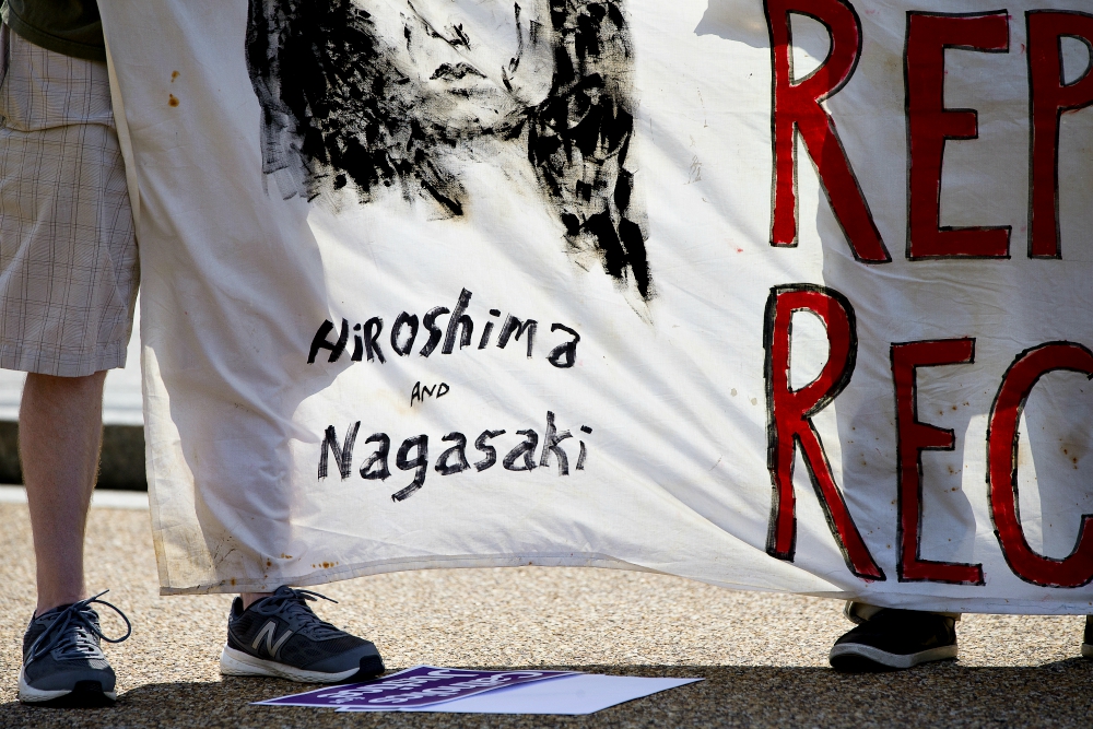 Peace activists hold a Catholic prayer service of repentance near the White House Aug. 9, 2018, for the use of nuclear weapons on Japan during World War II. (CNS/Tyler Orsburn) Peace activists hold a Catholic prayer service of repentance near the White House Aug. 9, 2018, for the use of nuclear weapons on Japan during World War II. (CNS/Tyler Orsburn)