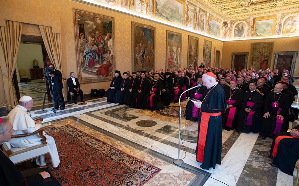 Pope Francis listens as Cardinal Marc Ouellet speaks during a meeting with recently appointed bishops from around the world at the Vatican Sept. 13, 2018. (CNS/Vatican Media)
