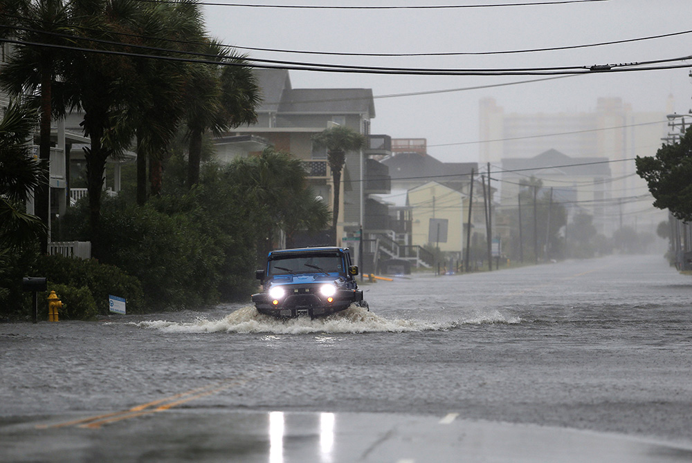 A vehicle navigates a flooded road Sept. 14, 2018, during Hurricane Florence in North Myrtle Beach, South Carolina. The next year, the coastal city of Charleston experienced 89 days of flooding, nearly one every five days. Charleston's previous record, 58 A vehicle navigates a flooded road Sept. 14, 2018, during Hurricane Florence in North Myrtle Beach, South Carolina. The next year, the coastal city of Charleston experienced 89 days of flooding, nearly one every five days. Charleston's previous record, 58