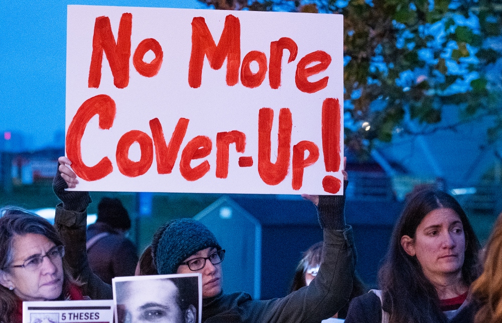 Suzanne Emerson, from Silver Spring, Maryland, holds a sign during a Nov. 12 press conference held by the Survivors Network of those Abused by Priests (SNAP) as the U.S. bishops meet in Baltimore. (CNS/Catholic Review/Kevin J. Parks)