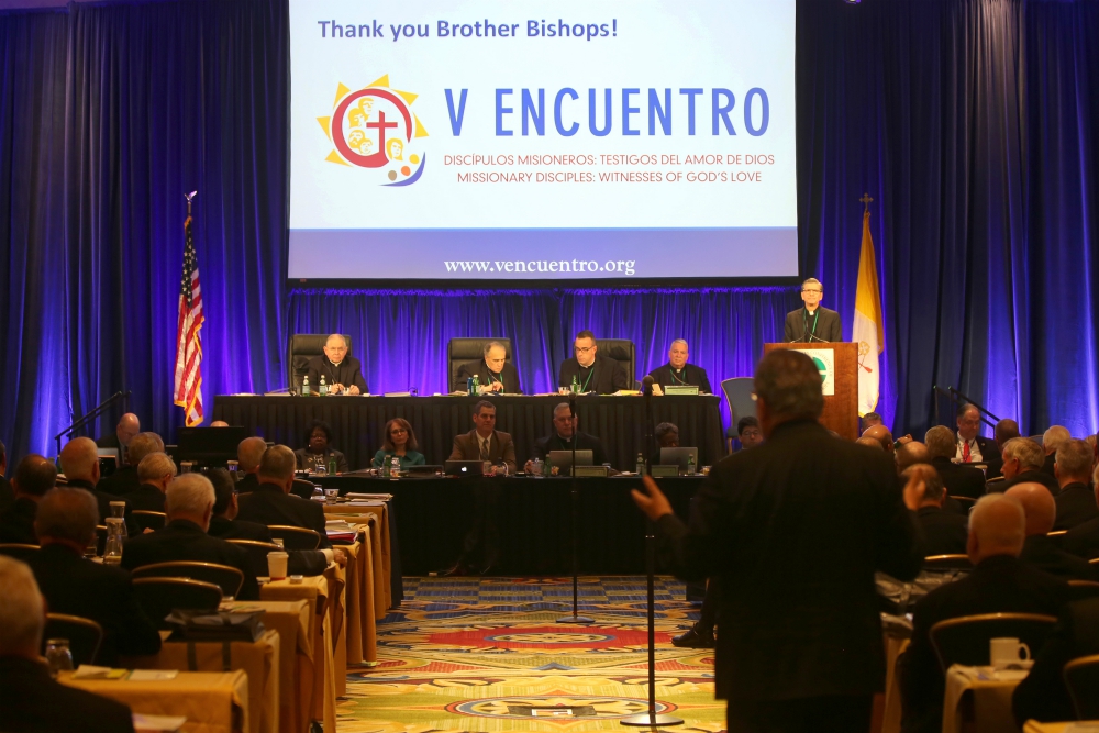 San Antonio Archbishop Gustavo García-Siller, at podium, listens to a question as he gives a report on V Encuentro at the 2018 fall general assembly of the U.S. Conference of Catholic Bishops in Baltimore. (CNS/Bob Roller) San Antonio Archbishop Gustavo García-Siller, at podium, listens to a question as he gives a report on V Encuentro at the 2018 fall general assembly of the U.S. Conference of Catholic Bishops in Baltimore. (CNS/Bob Roller)