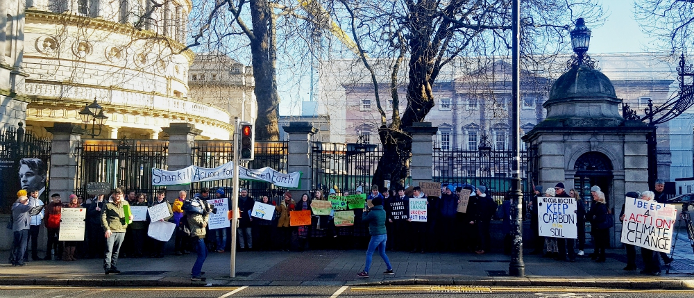 A climate action is held Feb. 1 outside the Dáil Éireann, the Irish house of parliament, in Dublin. (Courtesy of Lorna Gold) A climate action is held Feb. 1 outside the Dáil Éireann, the Irish house of parliament, in Dublin. (Courtesy of Lorna Gold)