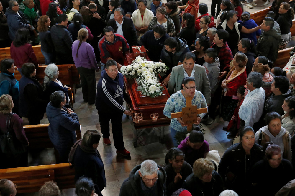 Mexican pray, priests celebrate funerals after pipeline