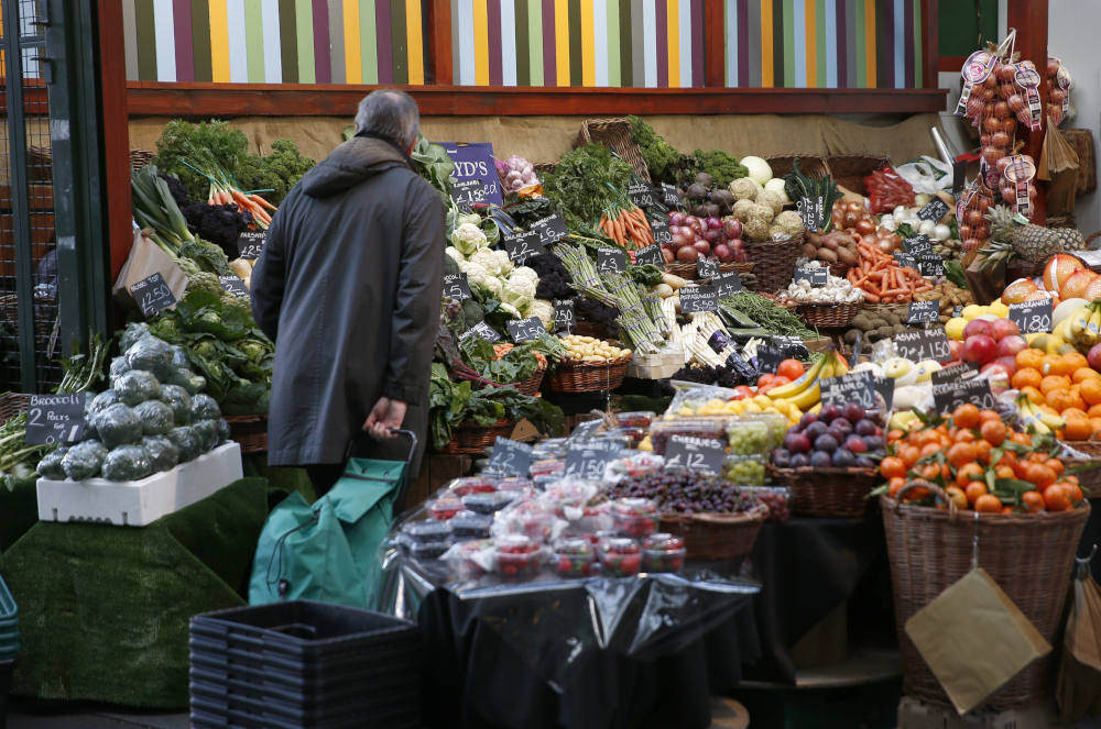 A shopper browses at a vegetable market in London Feb. 3, 2017. (CNS photo/Peter Nicholls, Reuters)