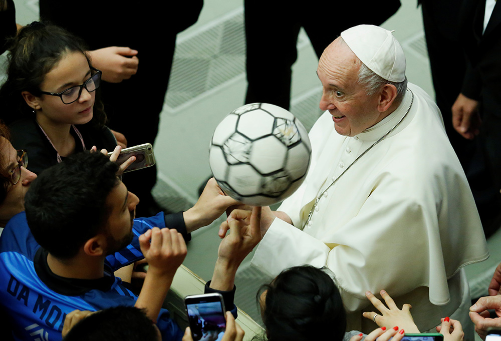 Pope Francis participates alongside thousands of young soccer athletes in a project to promote the values of sport and soccer at the Vatican May 24, 2019. (CNS/Reuters/Remo Casilli) Pope Francis participates alongside thousands of young soccer athletes in a project to promote the values of sport and soccer at the Vatican May 24, 2019. (CNS/Reuters/Remo Casilli)
