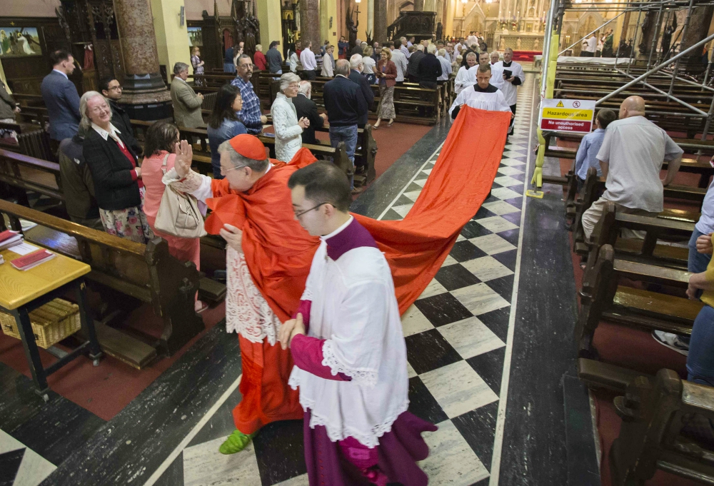 U.S. Cardinal Raymond Burke waves to the congregation after celebrating Mass at Sts. Peter and Paul Church in Cork City, Ireland, July 7. (CNS/Cillian Kelly) U.S. Cardinal Raymond Burke waves to the congregation after celebrating Mass at Sts. Peter and Paul Church in Cork City, Ireland, July 7. (CNS/Cillian Kelly)