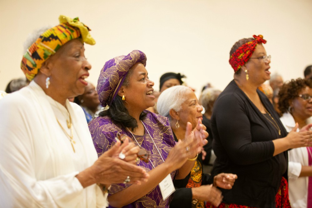 Participants at the Archbishop Lyke Conference sing together during the gathering's closing Mass July 6, 2019, in National Harbor, Maryland. (CNS/Catholic Standard/Andrew Rozario)