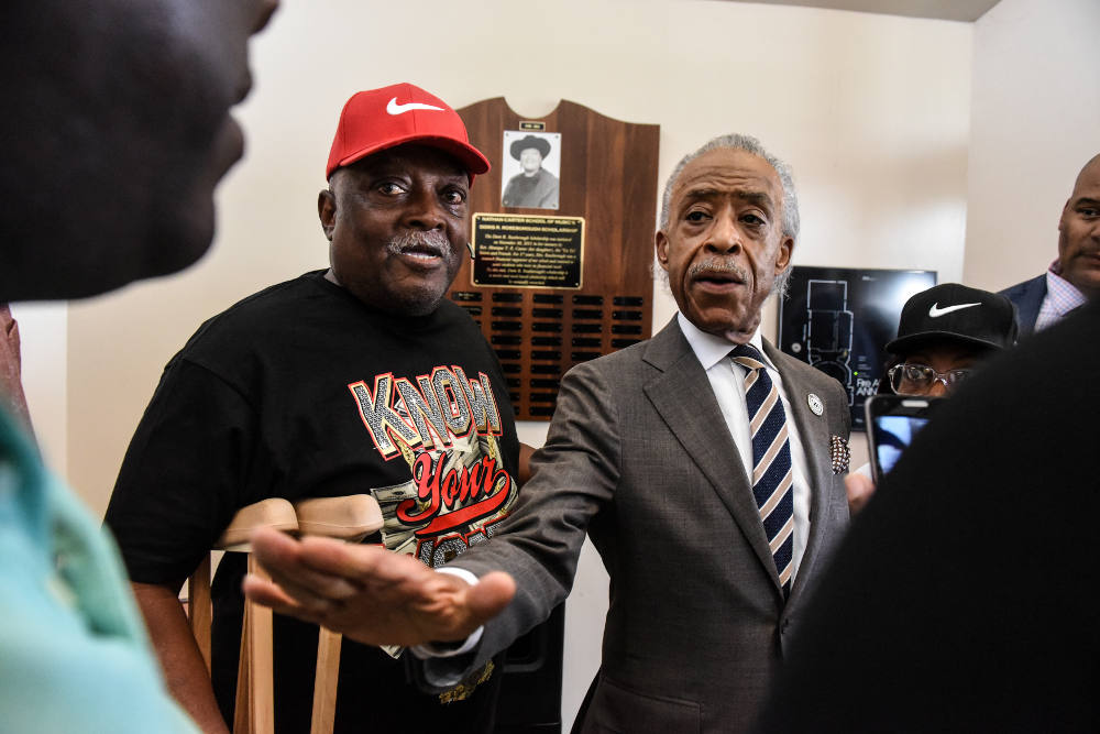 The Rev. Al Sharpton from the National Action Network speaks with hecklers after a July 29, 2019, news conference addressing U.S. President Donald Trump's tweets about Baltimore. (CNS photo/Stephanie Keith, Reuters)