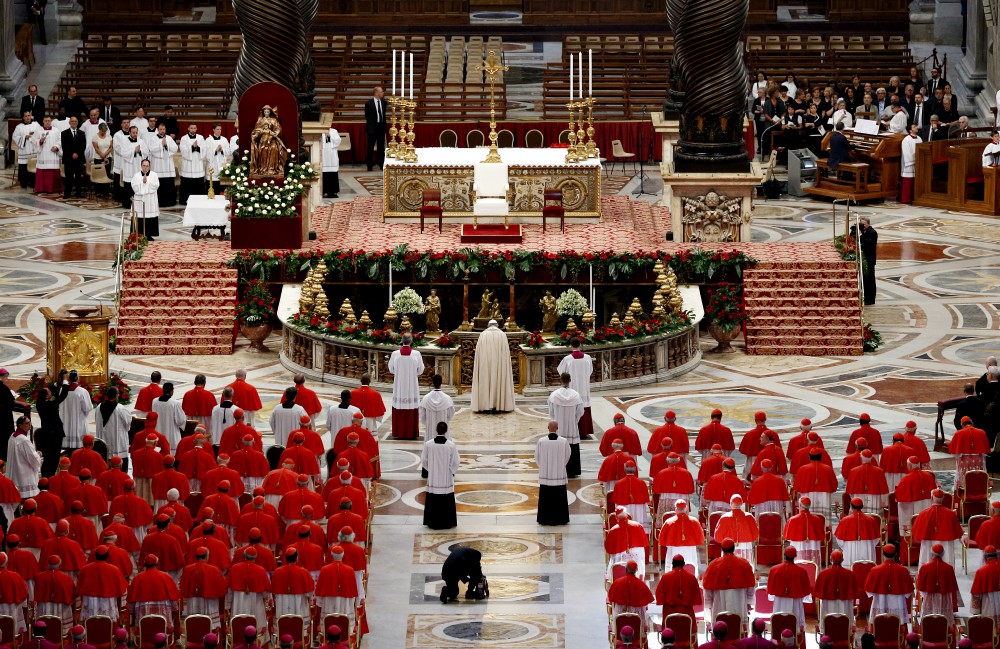 Pope Francis prays as he arrives for a consistory to create new cardinals in St. Peter's Basilica at the Vatican in June 2017. (CNS/Paul Haring) Pope Francis prays as he arrives for a consistory to create new cardinals in St. Peter's Basilica at the Vatican in June 2017. (CNS/Paul Haring)