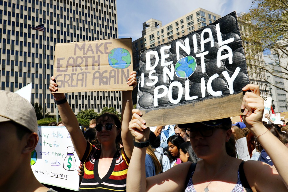 Young women hold signs while participating in the Global Climate Strike in New York City Sept. 20. (CNS/Gregory A. Shemitz) Young women hold signs while participating in the Global Climate Strike in New York City Sept. 20. (CNS/Gregory A. Shemitz)