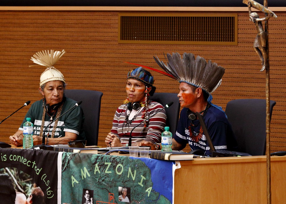 Dona Zenilda with the Xucuru people; Ednamar de Oliveira Viana, a leader of the Satere-Mawe people; and Francisco Chagas Chafre de Souza, a leader of the Apurina, all three from Brazil (CNS/Paul Haring) Dona Zenilda with the Xucuru people; Ednamar de Oliveira Viana, a leader of the Satere-Mawe people; and Francisco Chagas Chafre de Souza, a leader of the Apurina, all three from Brazil (CNS/Paul Haring)
