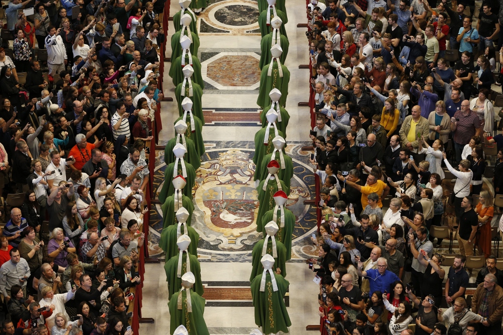 Bishops walk in procession as they arrive for the concluding Mass of the Synod of Bishops for the Amazon celebrated by Pope Francis at the Vatican Oct. 27. (CNS/Paul Haring) Bishops walk in procession as they arrive for the concluding Mass of the Synod of Bishops for the Amazon celebrated by Pope Francis at the Vatican Oct. 27. (CNS/Paul Haring)