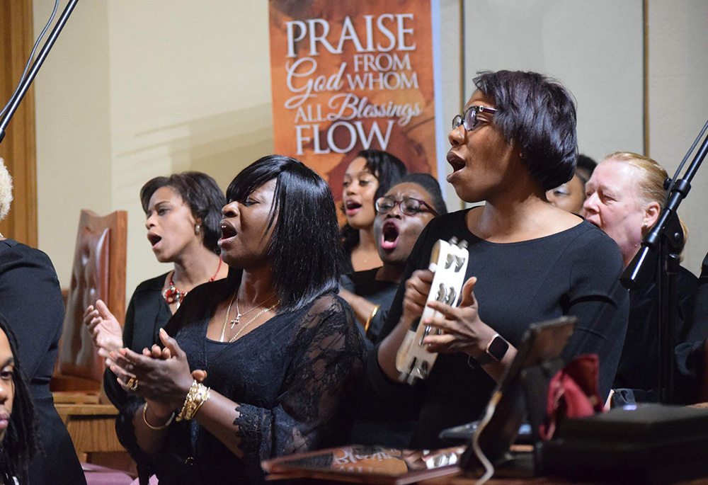 Members of the Voice of Praise Ensemble sing during Mass Nov. 17, 2019, at St. Therese of Lisieux Church in Brooklyn, New York, in celebration of November as National Black Catholic History Month. (CNS/The Tablet/Andrew Pugliese)