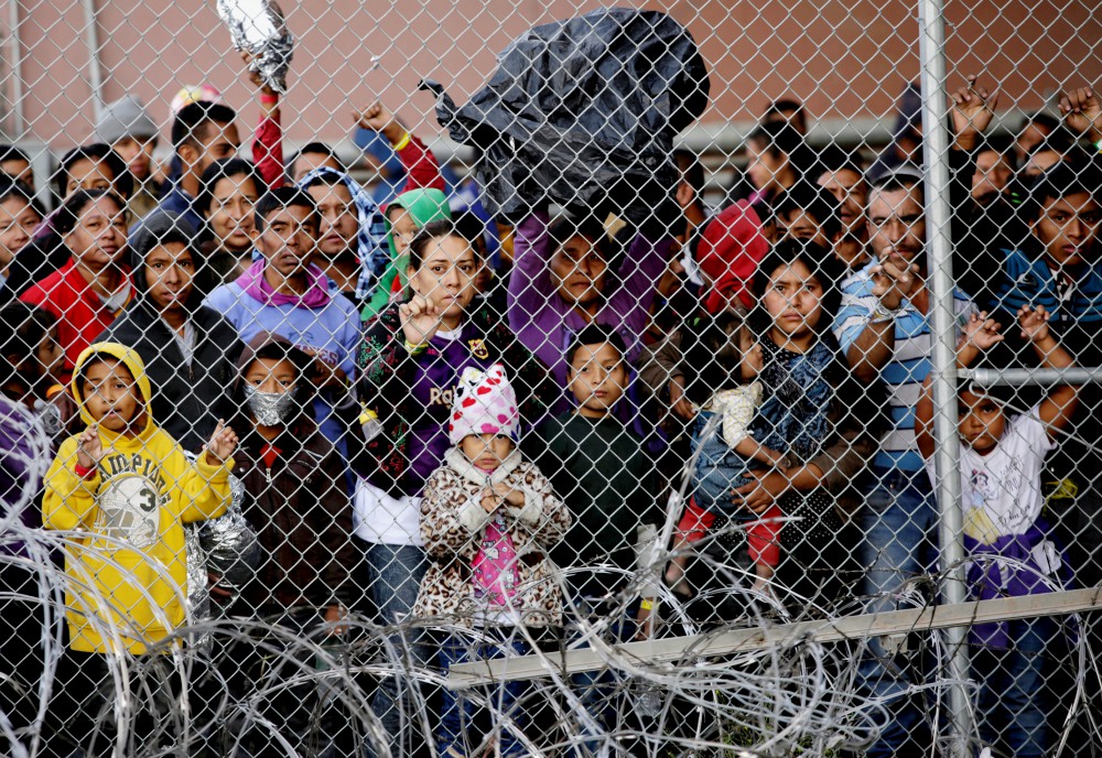 Central American migrants are seen inside an enclosure in El Paso, Texas, March 27, 2019. (CNS/Reuters/Jose Luis Gonzalez)