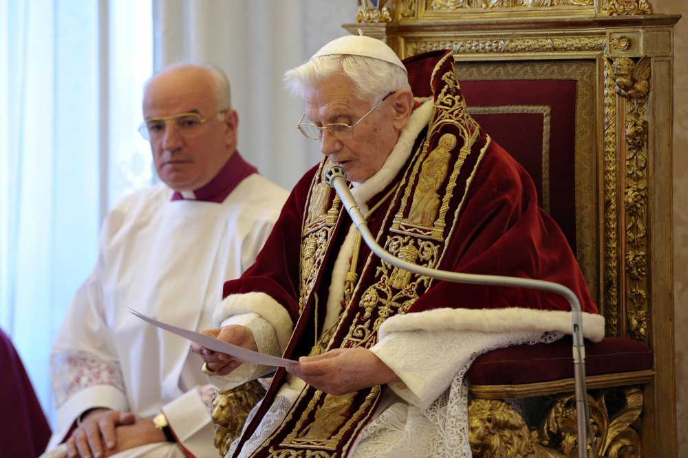 Pope Benedict XVI reads his resignation in Latin during a meeting of cardinals at the Vatican on Feb. 11, 2013. (CNS/L'Osservatore Romano)