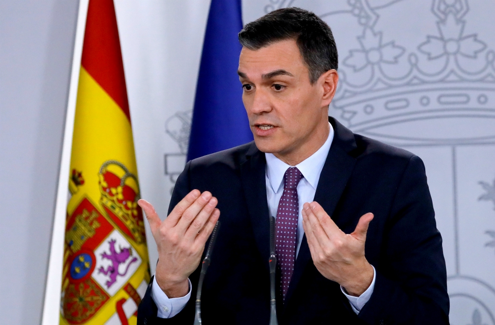 Spanish Prime Minister Pedro Sanchez gestures at a news conference after the first Cabinet meeting at Moncloa Palace in Madrid Jan. 14. (CNS/Reuters/Jon Nazca) Spanish Prime Minister Pedro Sanchez gestures at a news conference after the first Cabinet meeting at Moncloa Palace in Madrid Jan. 14. (CNS/Reuters/Jon Nazca)