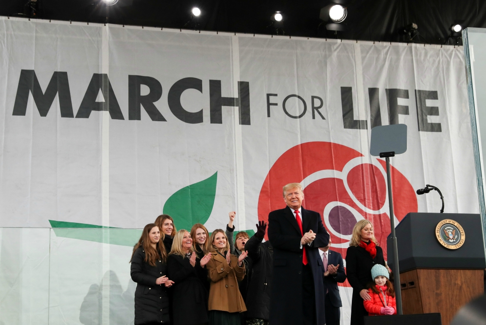 U.S. President Donald Trump applauds after addressing thousands during the 47th annual March for Life in Washington Jan. 24. (CNS/Reuters/Leah Millis) U.S. President Donald Trump applauds after addressing thousands during the 47th annual March for Life in Washington Jan. 24. (CNS/Reuters/Leah Millis)