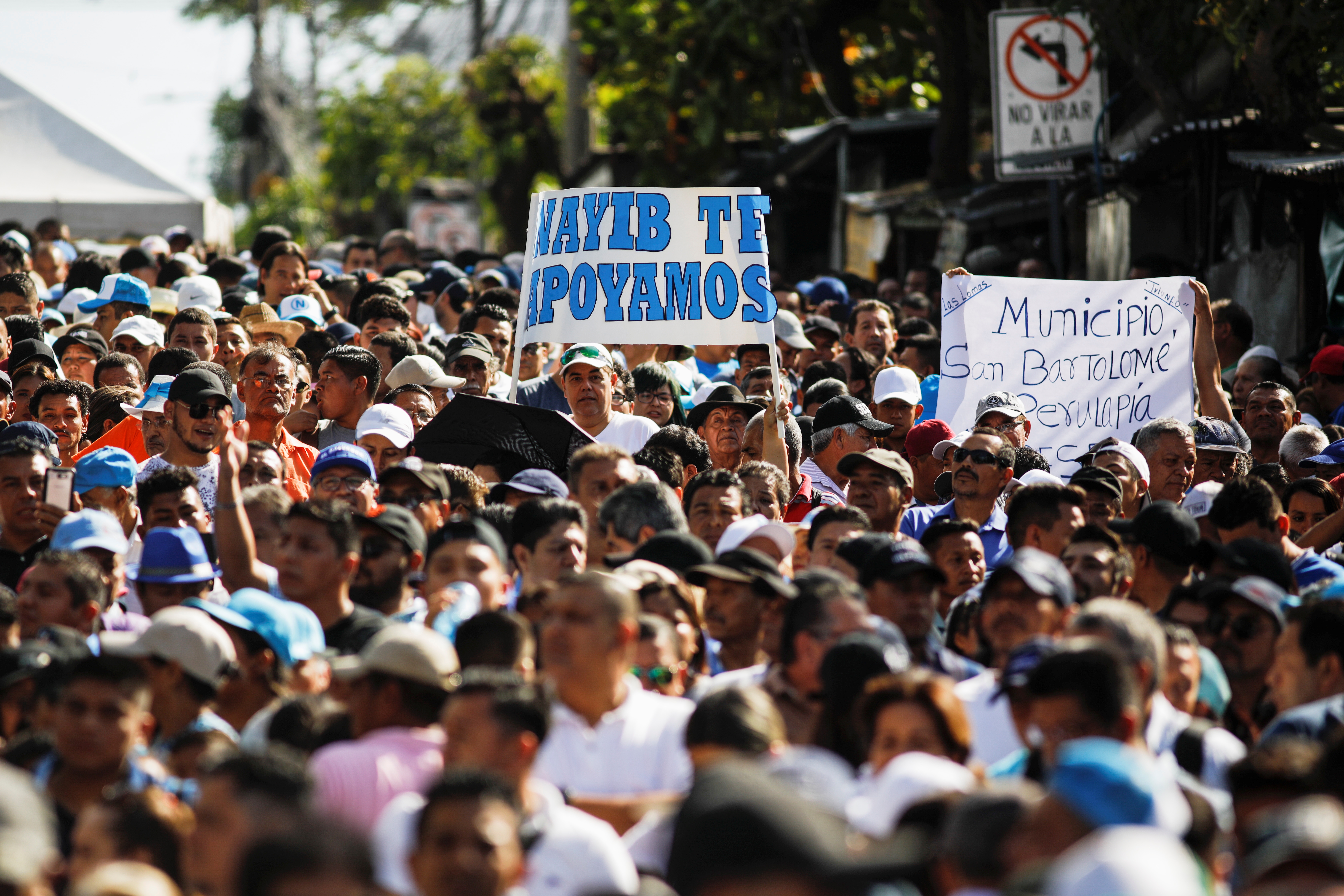 Supporters of Salvadoran President Nayib Bukele protest outside the national congress in San Salvador to push for the approval of funds for a government security plan Feb. 9. (CNS/Reuters/Jose Cabezas)