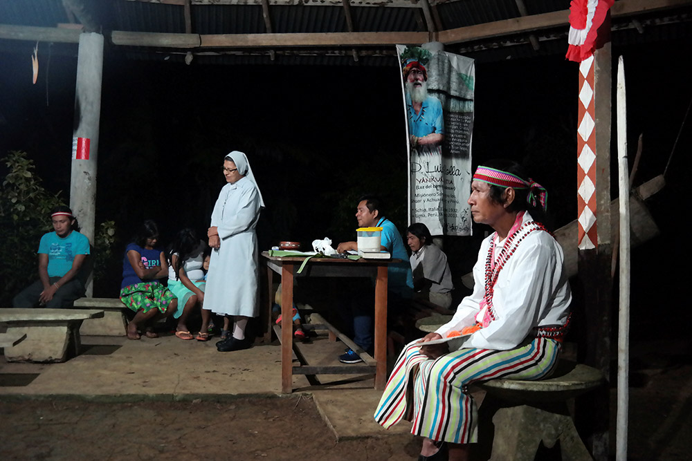 Deacon Shainkiam Yampik Wananch leads a liturgy with indigenous Achuar people at a chapel in Wijint, a village in the Peruvian Amazon, Aug. 20, 2019. (CNS/Reuters/Maria Cervantes)
