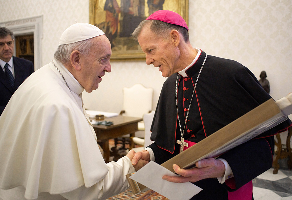 Pope Francis greets Archbishop John Wester of Santa Fe, New Mexico, during an audience with U.S. bishops making their "ad limina" visits to the Vatican Feb. 10, 2020, to report on the status of their dioceses. (CNS/Vatican Media)