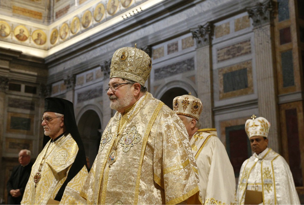 Bishop John Michael Botean, center, and other bishops of the Eastern Catholic churches in the U.S. arrive at the Basilica of St. Paul Outside the Walls in Rome Feb. 17. (CNS/Paul Haring) Bishop John Michael Botean, center, and other bishops of the Eastern Catholic churches in the U.S. arrive at the Basilica of St. Paul Outside the Walls in Rome Feb. 17. (CNS/Paul Haring)
